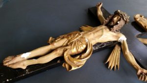 Damaged crucifix in need of repair